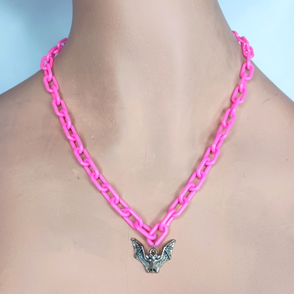 Plastic Bright Pink Link Necklace with Bat Pendant.